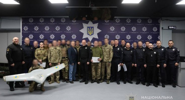 фахівці